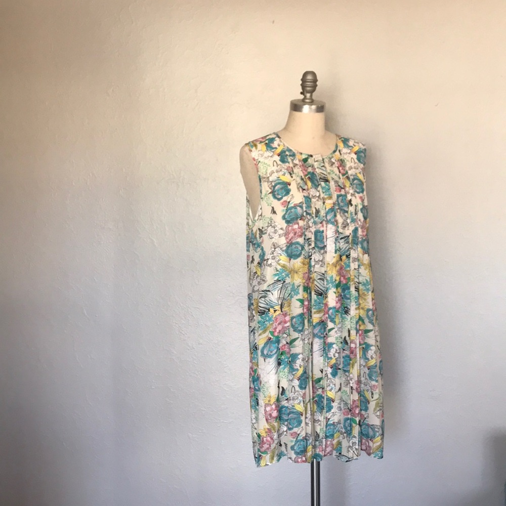 A sleeveless spring dress. Tags on.